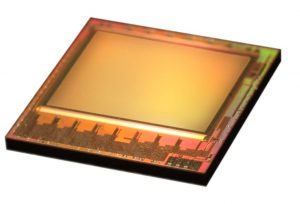 Fig.1: Highly integrated REAL3 image sensor single chip for 3D ToF applications features photo sensitive pixel array, sophisticated control logic, digital interfaces with ADCs and digital outputs