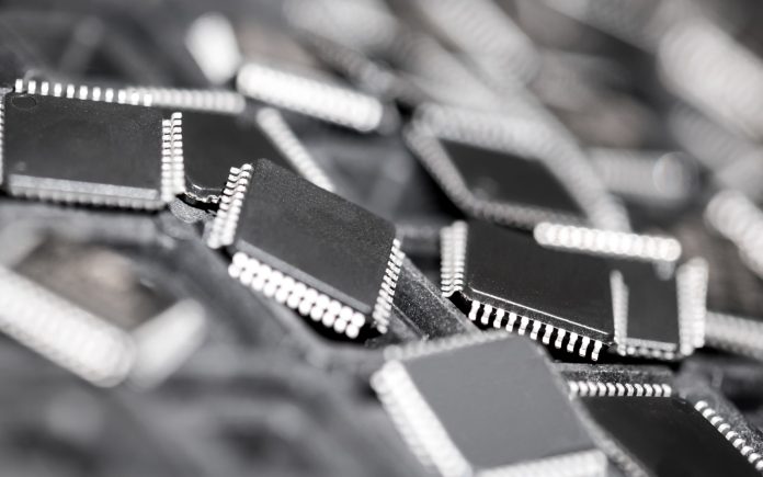 Heap of CPU micro controllers - Stock Photo