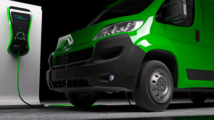a-green-electric-van-being-charged