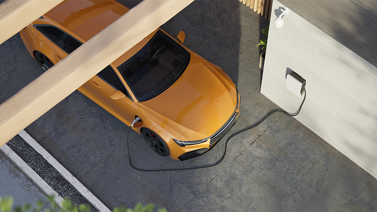 an-ev-charging-at-home-on-a-driveway